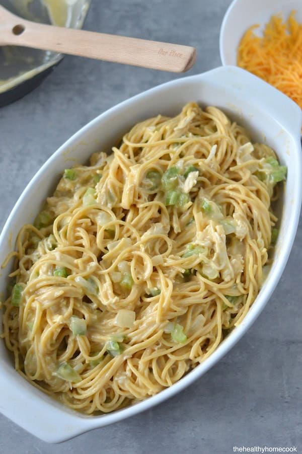 Creamy, cheesy, packed with flavor and PROTEIN — this lightened up Chicken Spaghetti is comfort food with a nutritious twist.