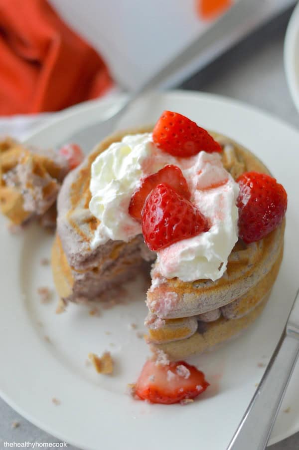 These Fluffy Strawberry Waffles are vibrant and delicious, turning your comforting breakfast classic into something truly special.