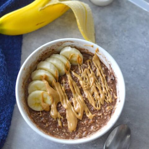 Loaded with protein, whole grains, and rich chocolatey flavor, this Protein Packed Brownie Batter Oatmeal makes a perfect morning meal.