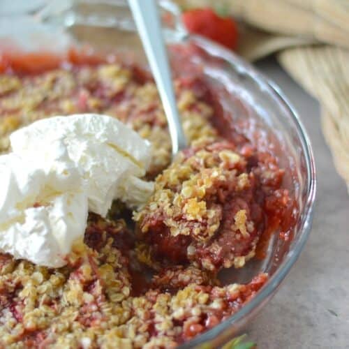 This Easy Strawberry Crisp can be made with fresh or frozen strawberries and is topped with a delicious oatmeal coconut oil crumble.