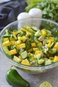Final image of Spicy Cucumber Pineapple Salad in serving bowl.