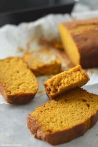 Image of pumpkin loaf slices sitting on top of another.